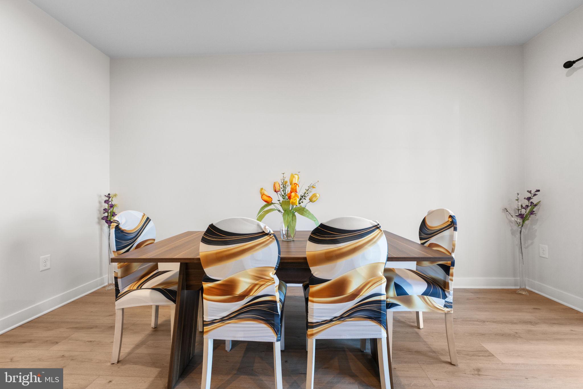 316 Longs Peak Way Exton, PA 19341 - Photo 18 of 46 a dining room with furniture and wooden floor