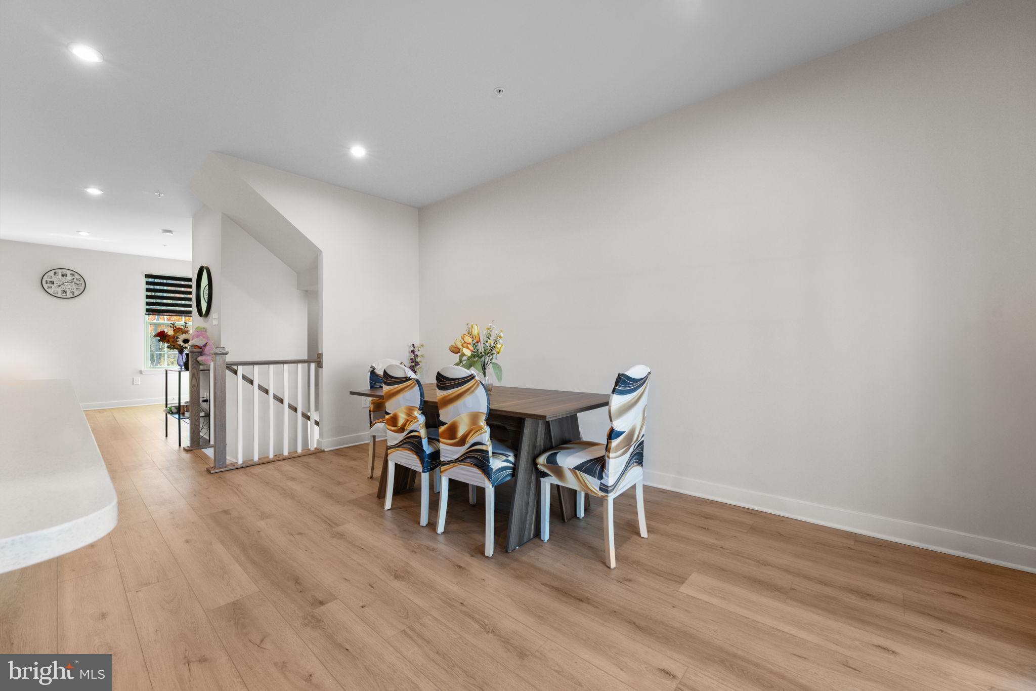 316 Longs Peak Way Exton, PA 19341 - Photo 19 of 46 a dining room with furniture and wooden floor