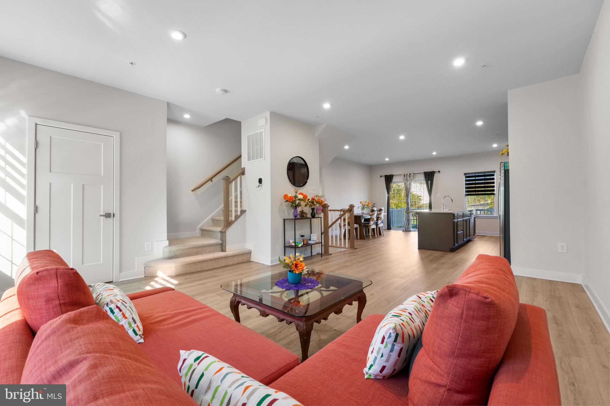 316 Longs Peak Way Exton, PA 19341 - Photo 22 of 46 a living room with furniture and kitchen view
