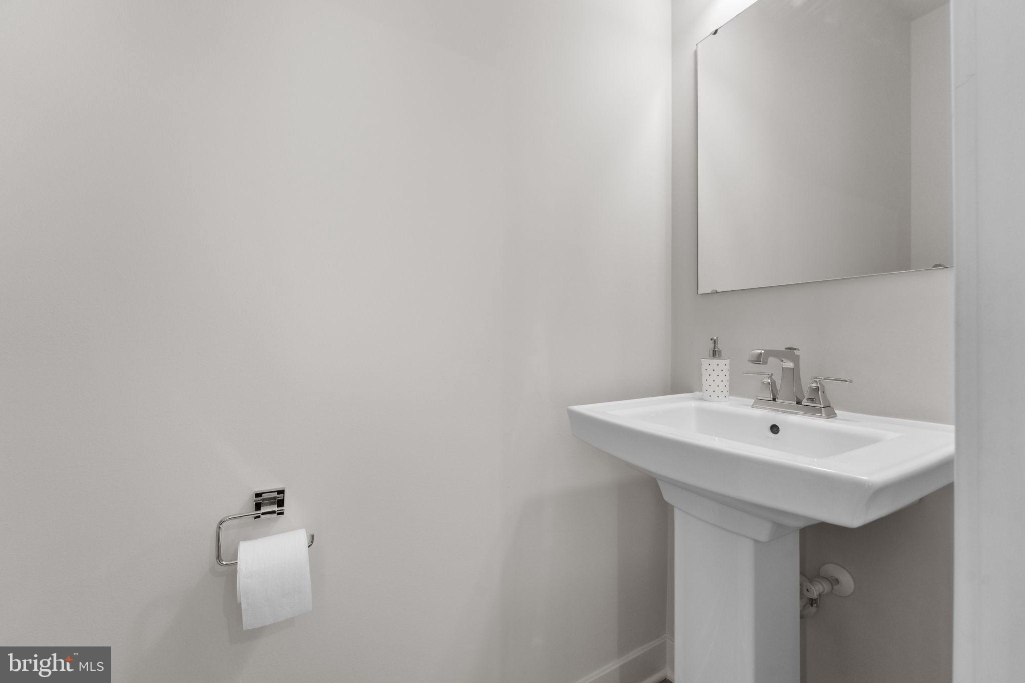 316 Longs Peak Way Exton, PA 19341 - Photo 23 of 46 a bathroom with a sink and a mirror