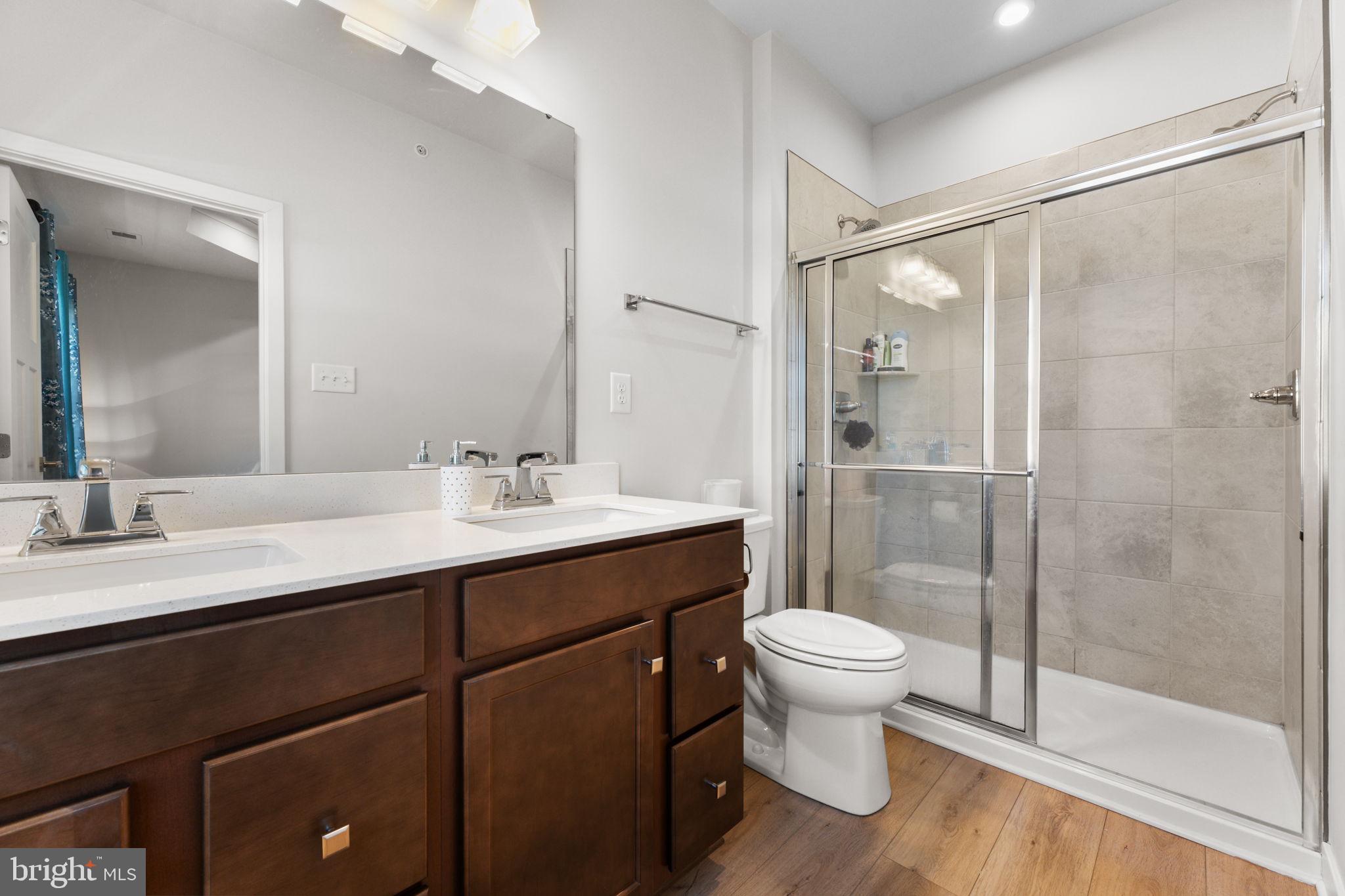 316 Longs Peak Way Exton, PA 19341 - Photo 30 of 46 a bathroom with a sink toilet and shower