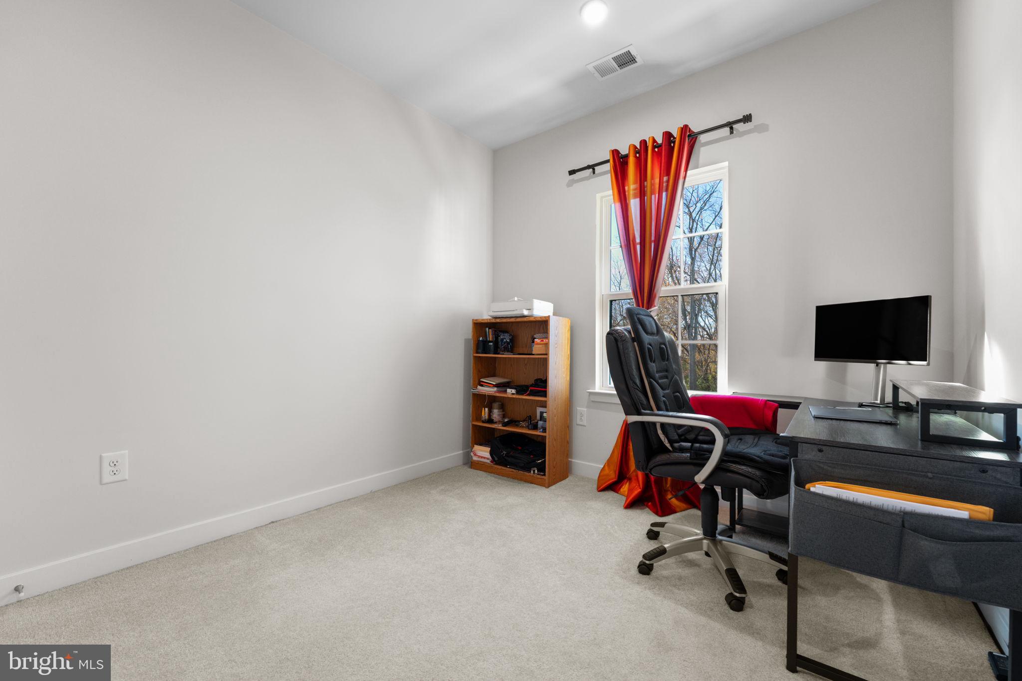 316 Longs Peak Way Exton, PA 19341 - Photo 35 of 46 a view of a workspace with furniture and gym equipment