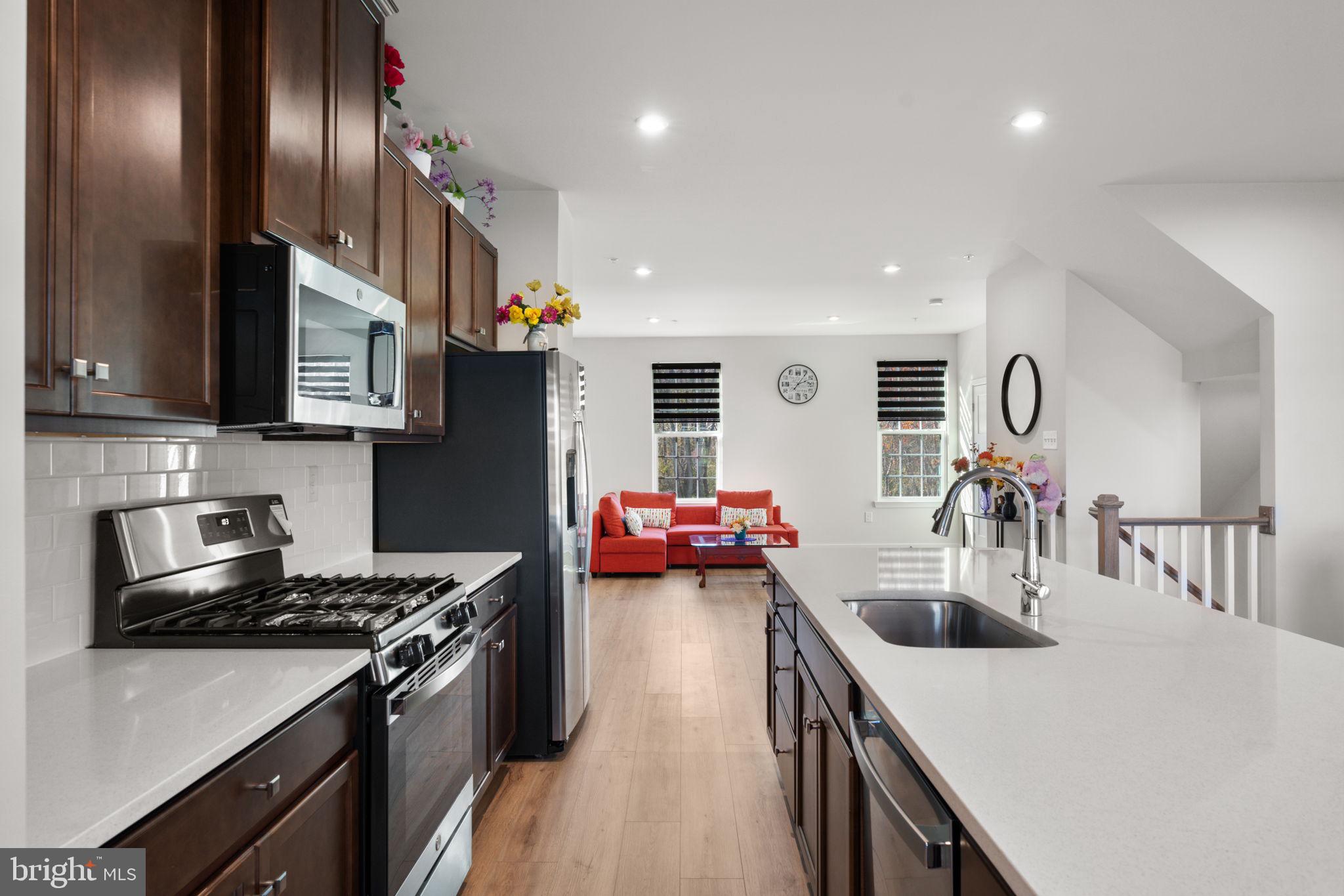 316 Longs Peak Way Exton, PA 19341 - Photo 6 of 46 a kitchen that has a lot of cabinets