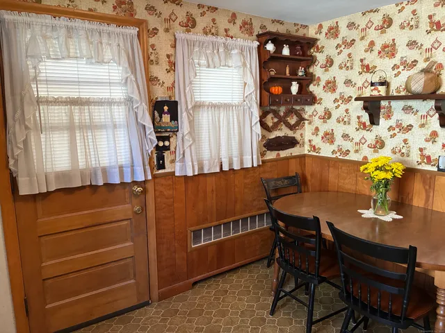 a view of a workspace with furniture