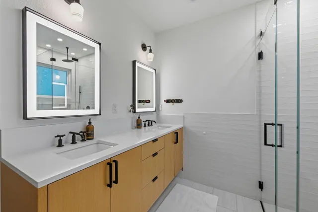 a bathroom with a sink and a mirror