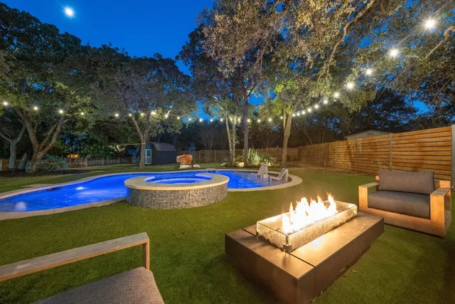 a view of a fountain with swimming pool