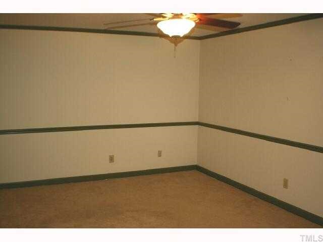 5015 Wickham Road Raleigh, NC 27606 - Photo 8 of 12 a view of an empty room