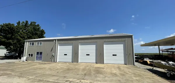 a view of a house with a garage