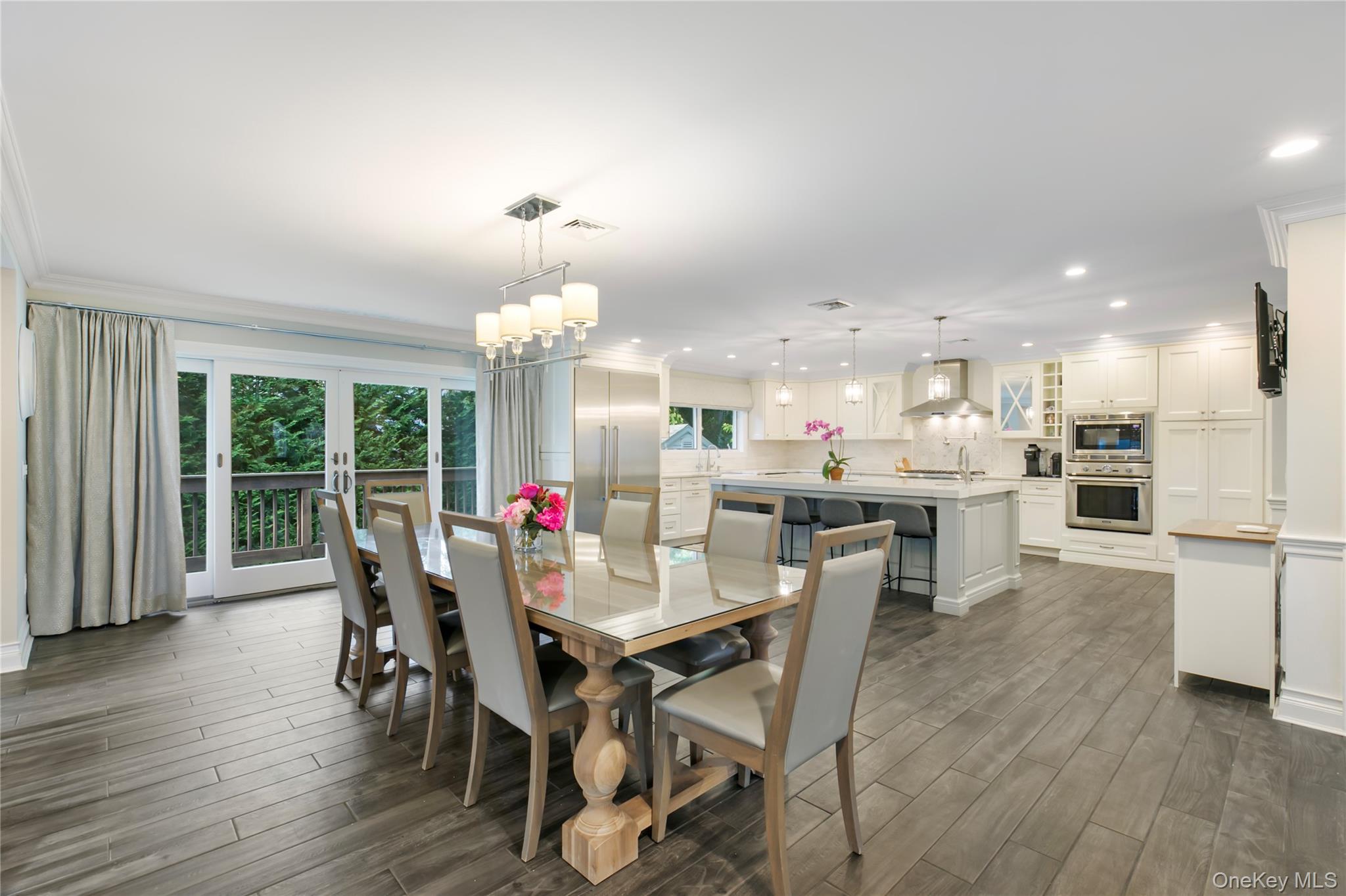 1945 Byron Road Merrick, NY 11566 - Photo 5 of 17 a dining room with furniture and wooden floor