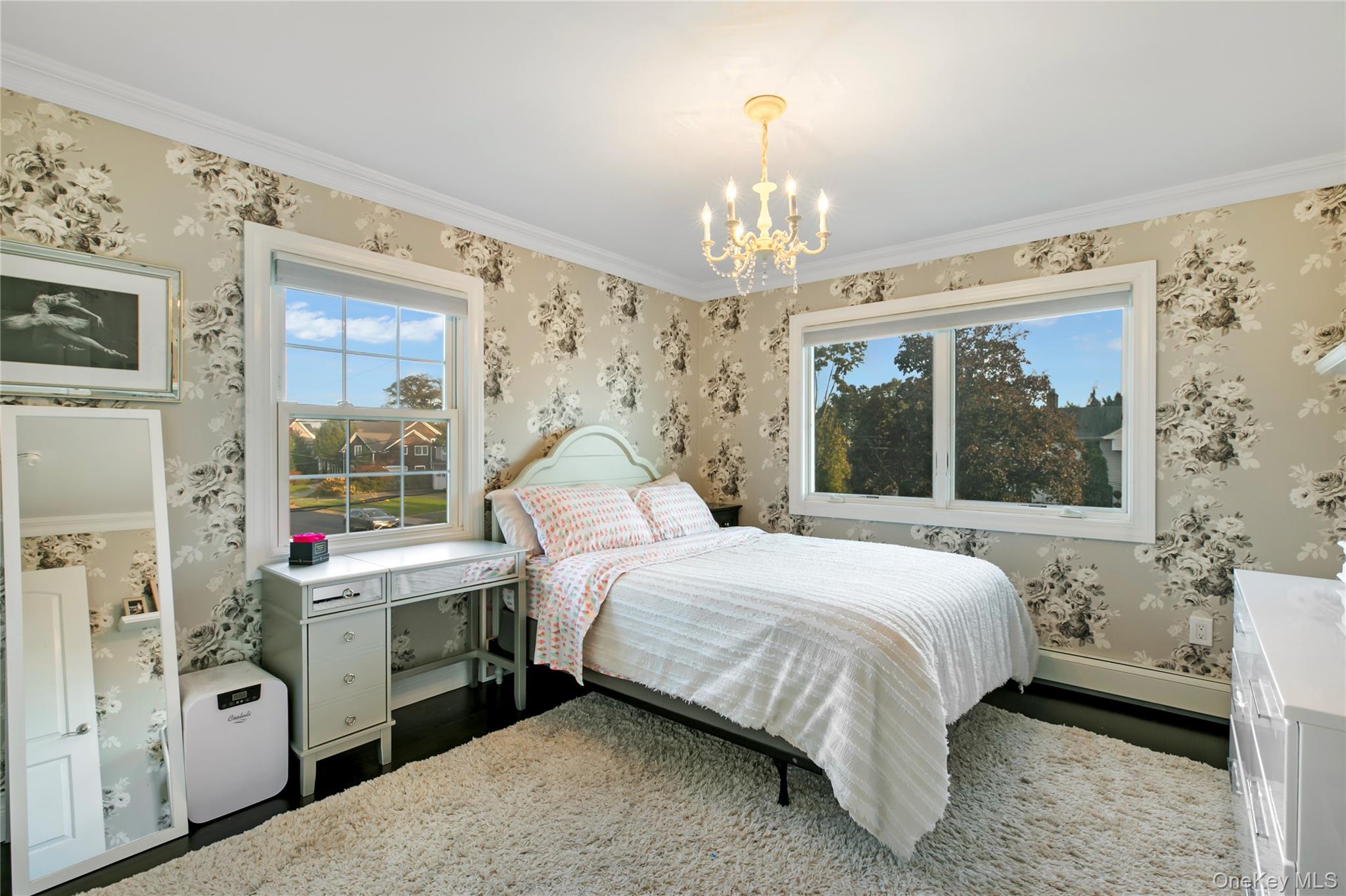 1945 Byron Road Merrick, NY 11566 - Photo 10 of 17 a bed room with a bed and a window