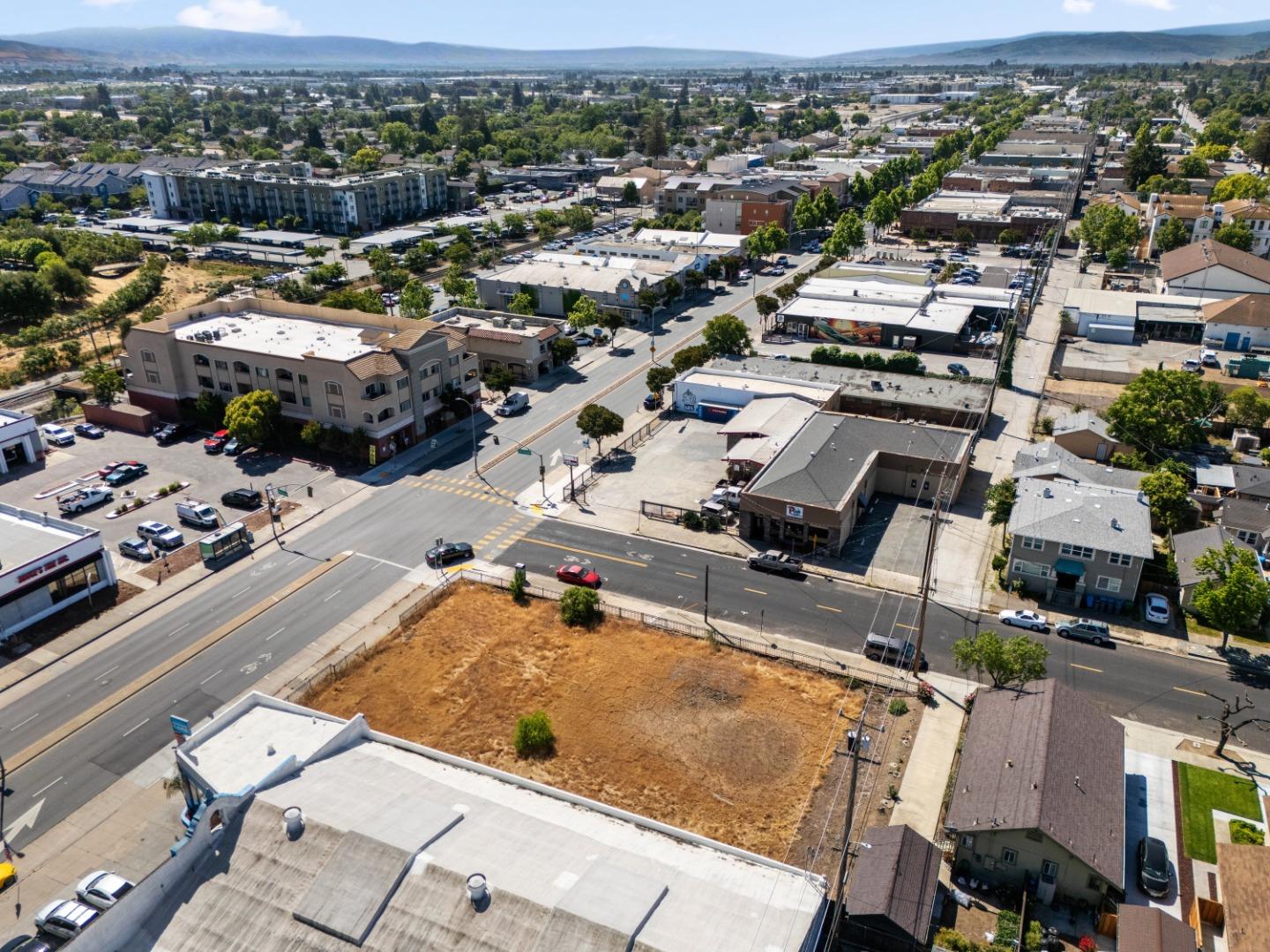 7711 Monterey Road Gilroy, CA 95020 - Photo 5 of 7 an aerial view of residential houses with outdoor space