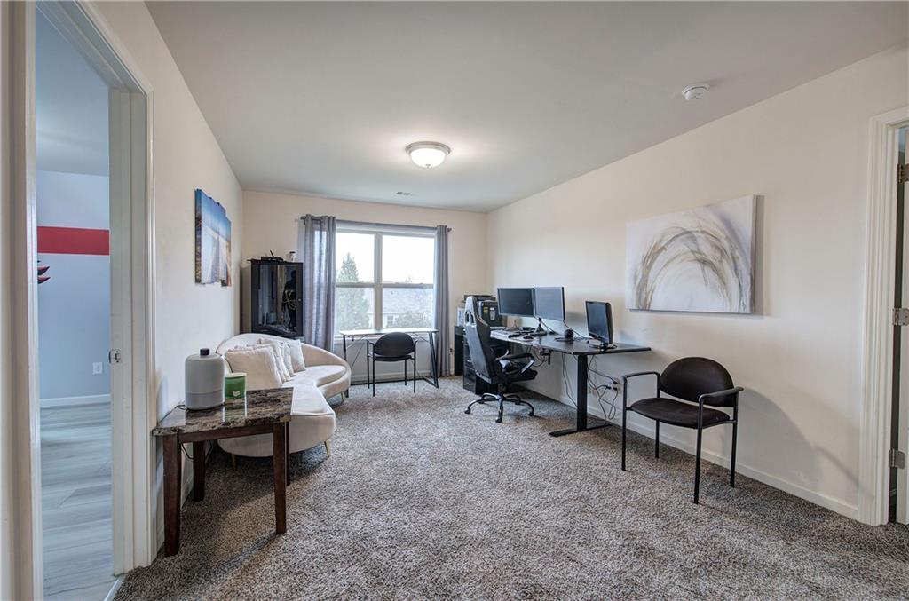218 Orchard Trail Canton, GA 30115 - Photo 27 of 39 a living room with furniture and a window