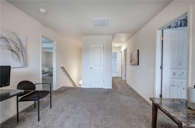 a view of livingroom with furniture and entryway