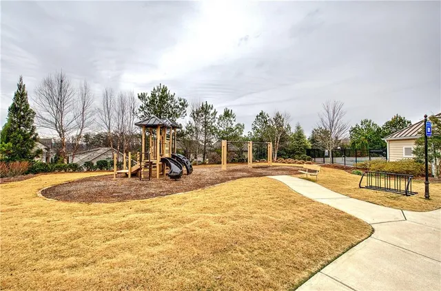 a view of a swimming pool with an outdoor seating