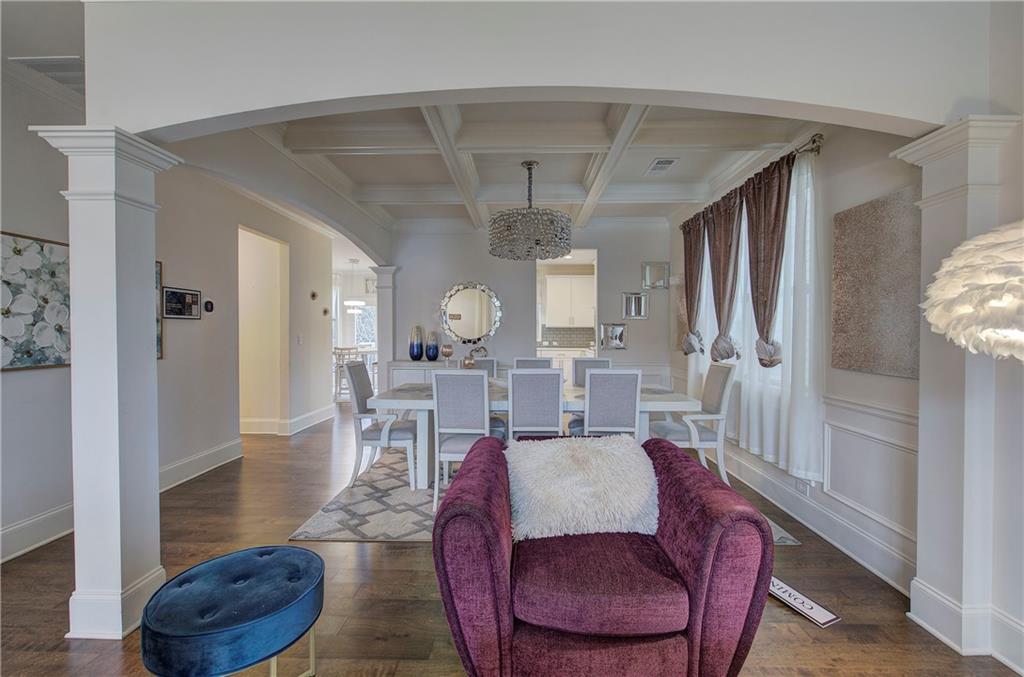 218 Orchard Trail Canton, GA 30115 - Photo 4 of 39 a living room with furniture and a chandelier