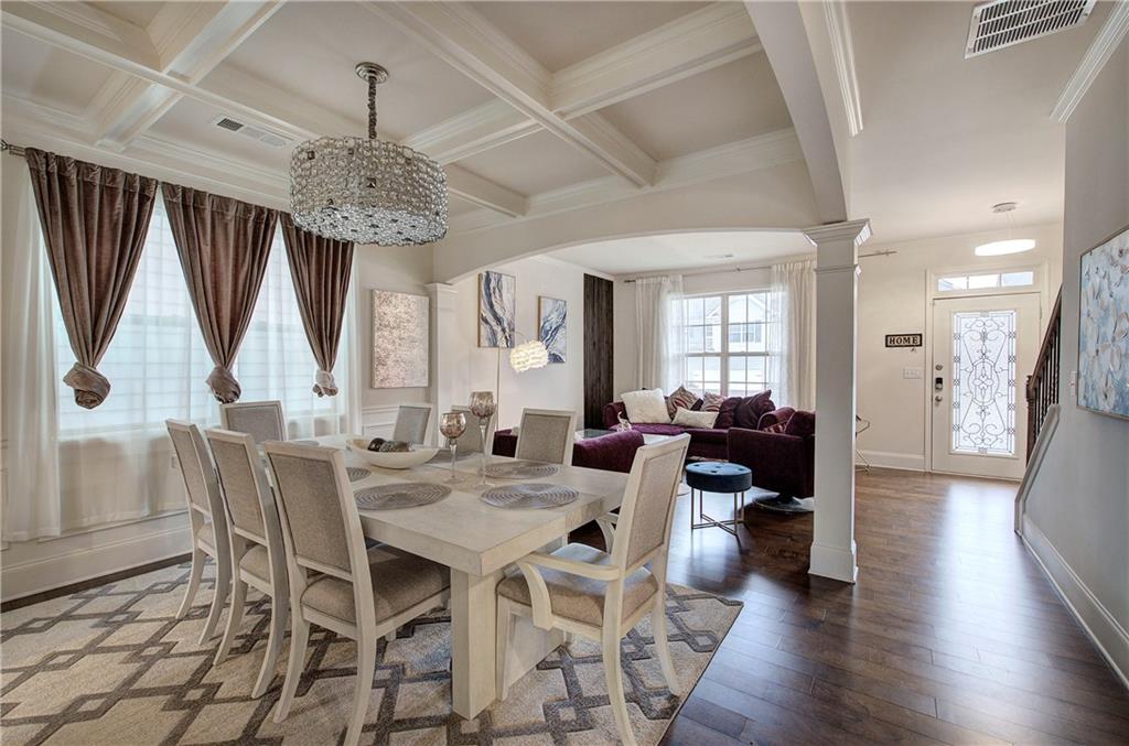 218 Orchard Trail Canton, GA 30115 - Photo 6 of 39 a view of a dining room with furniture window and wooden floor