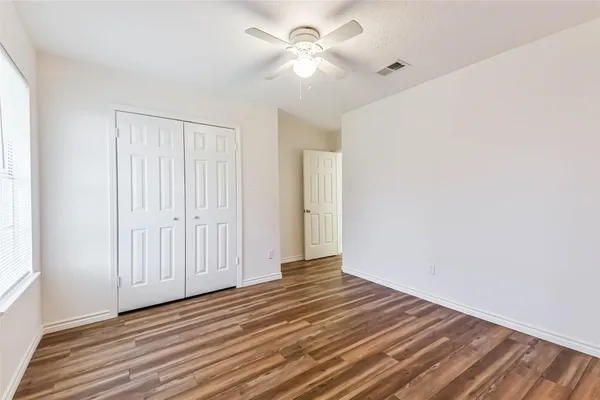 a view of a hallway with front door