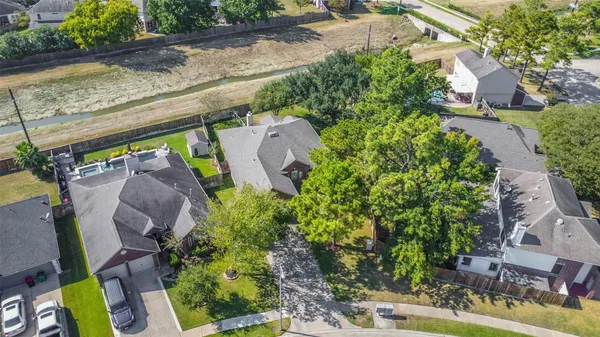 an aerial view of multiple house with outdoor space