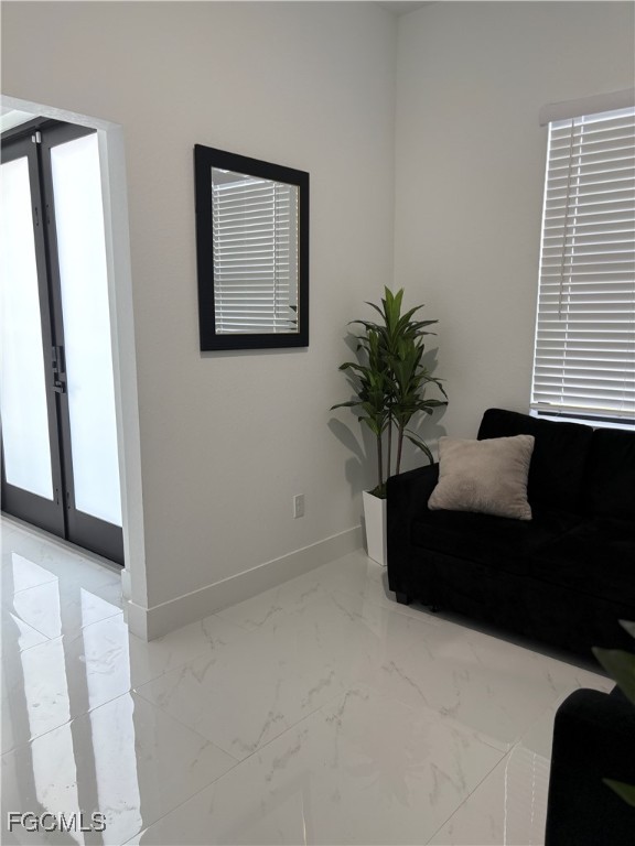 2608 25th Street West Lehigh Acres, FL 33971 - Photo 17 of 27 a vase of flowers sitting on a table
