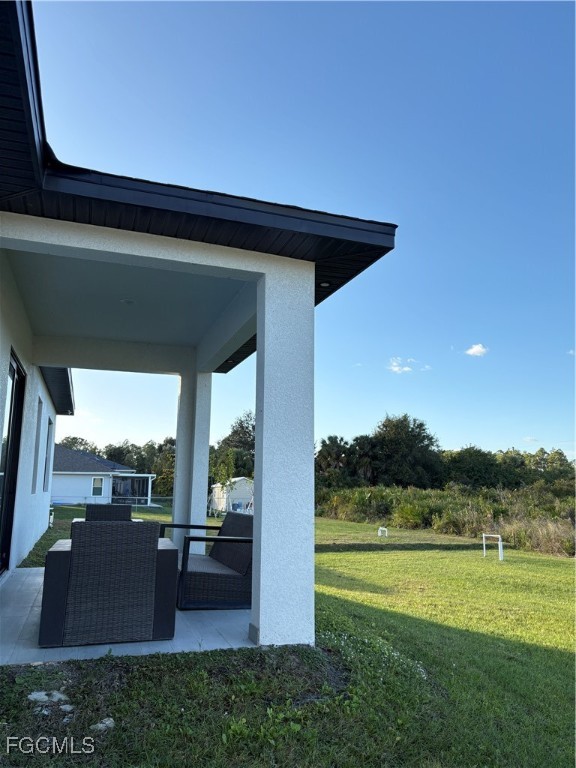 2608 25th Street West Lehigh Acres, FL 33971 - Photo 20 of 27 a view of outdoor space and yard