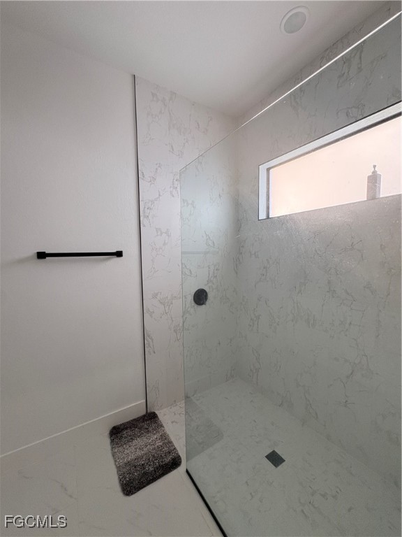 2608 25th Street West Lehigh Acres, FL 33971 - Photo 21 of 27 a bathroom with a shower