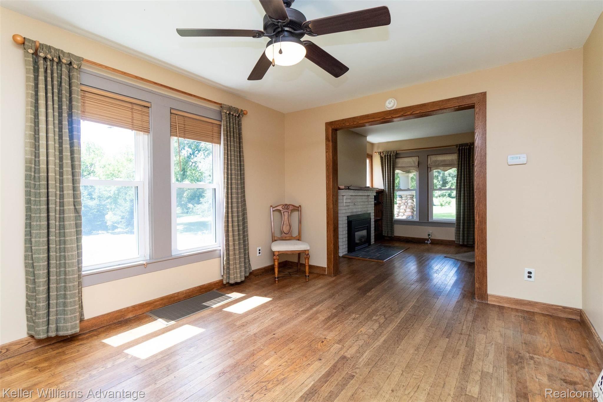 7953 Clark Lake Road Chelsea, MI 48118 - Photo 9 of 26 DINING RM TO LIVING RM.jpg