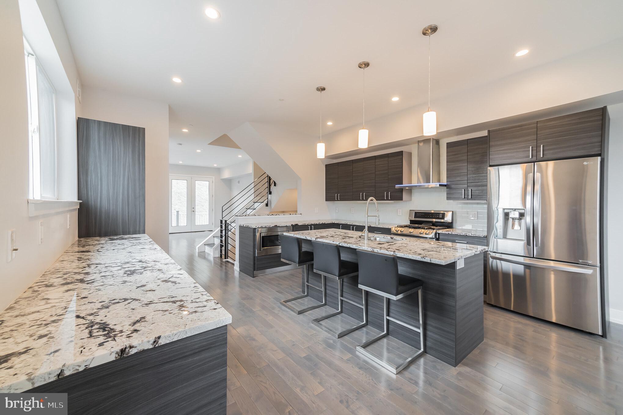 307-9 Reed Street, Unit A Philadelphia, PA 19147 - Photo 11 of 30 Kitchen with dining area