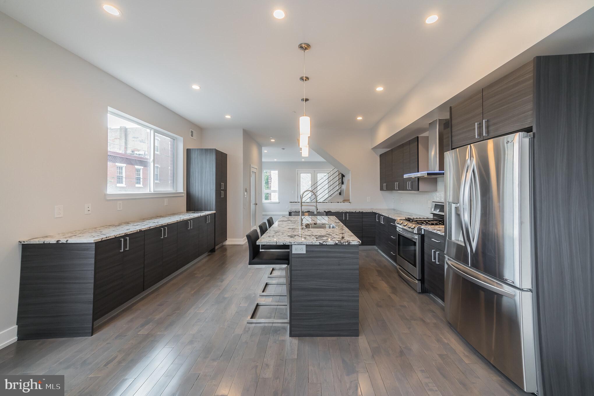 307-9 Reed Street, Unit A Philadelphia, PA 19147 - Photo 12 of 30 Kitchen with dining area