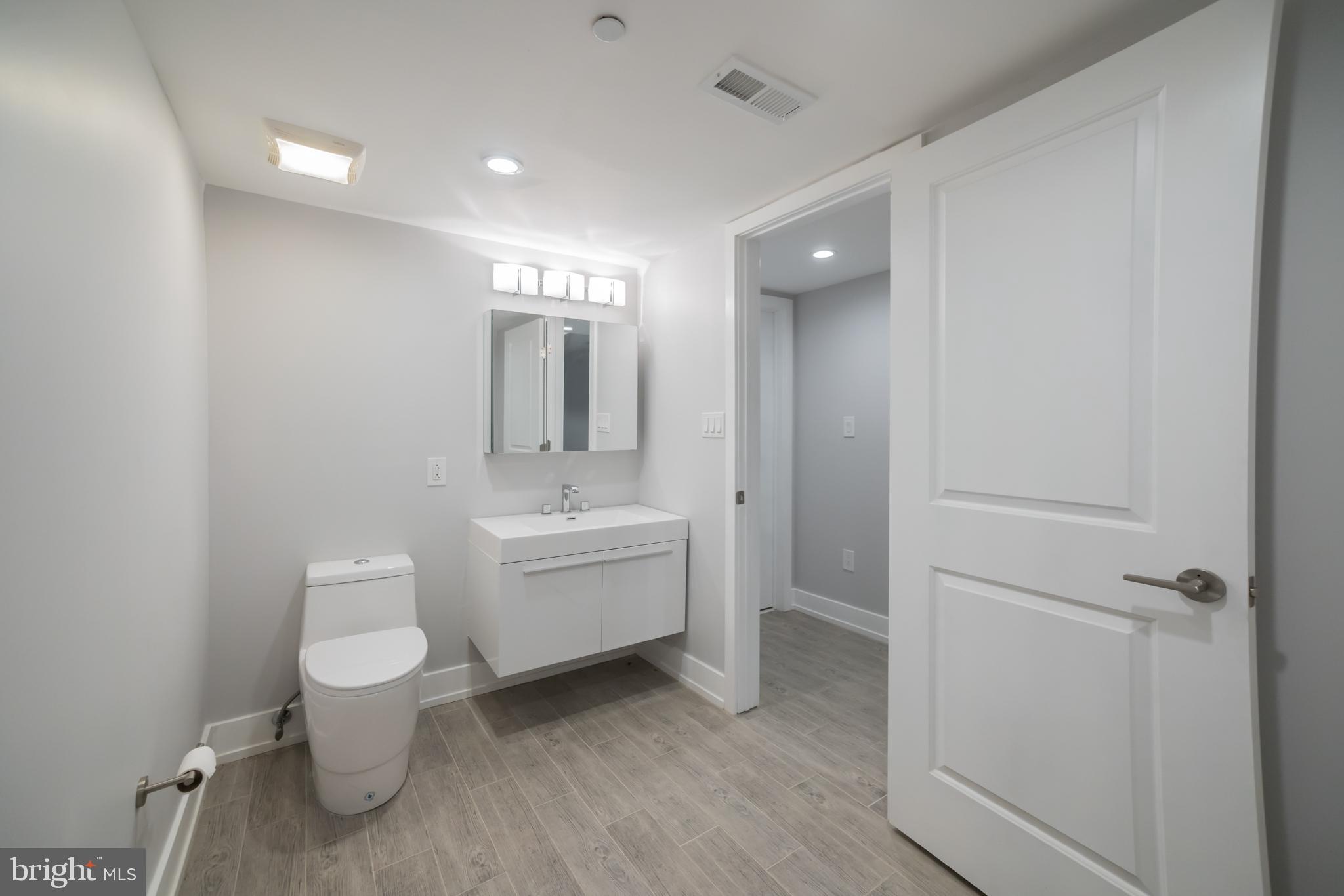 307-9 Reed Street, Unit A Philadelphia, PA 19147 - Photo 30 of 30 Basement powder room