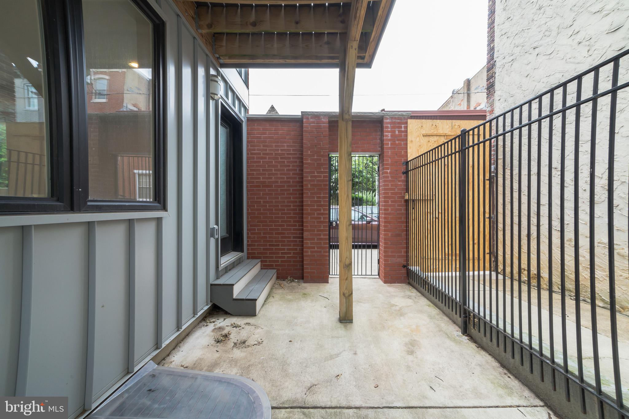 307-9 Reed Street, Unit A Philadelphia, PA 19147 - Photo 7 of 30 Rear patio