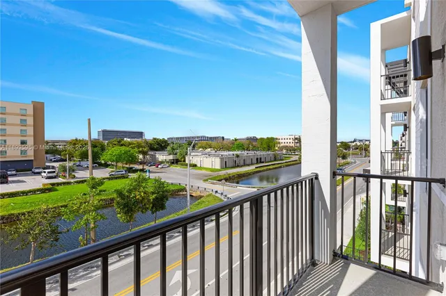 a view of a balcony with city view