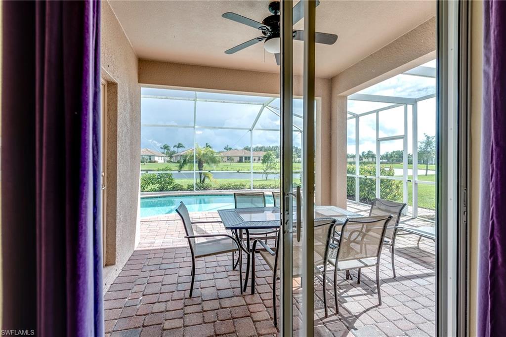 14796 Canton Court Naples, FL 34114 - Photo 15 of 22 a view of a dining room with furniture window and outside view