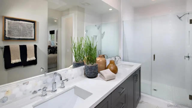 a kitchen with a sink and a refrigerator