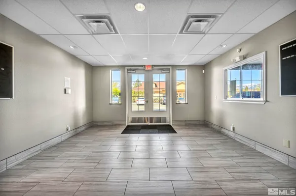 a view of an entryway with a window