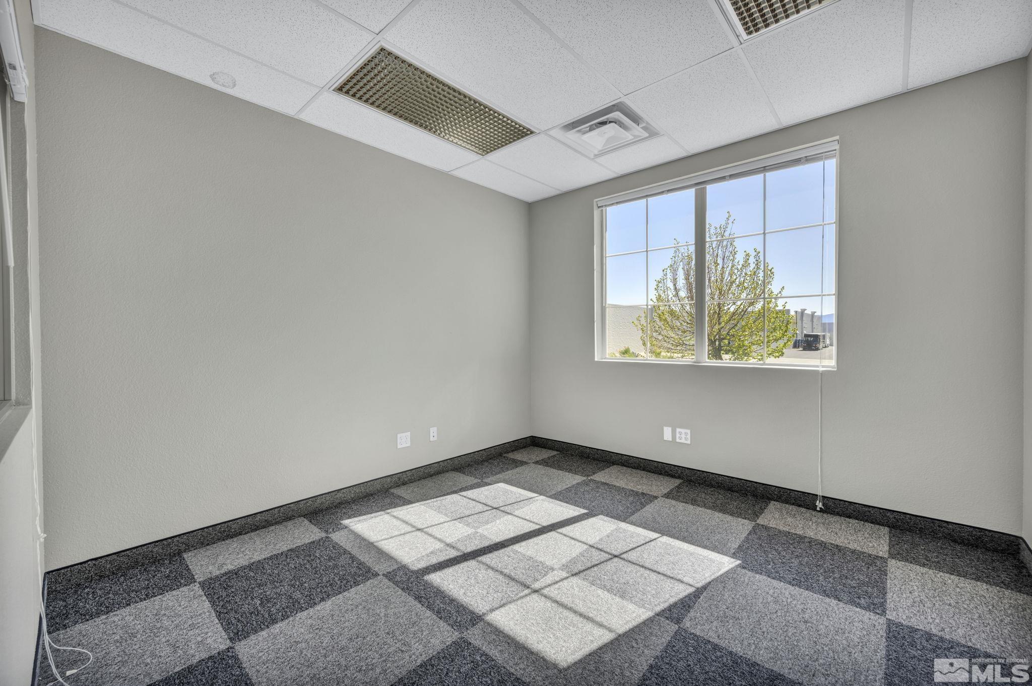 783 Basque Way Carson City, NV 89706 - Photo 16 of 39 an empty room with windows