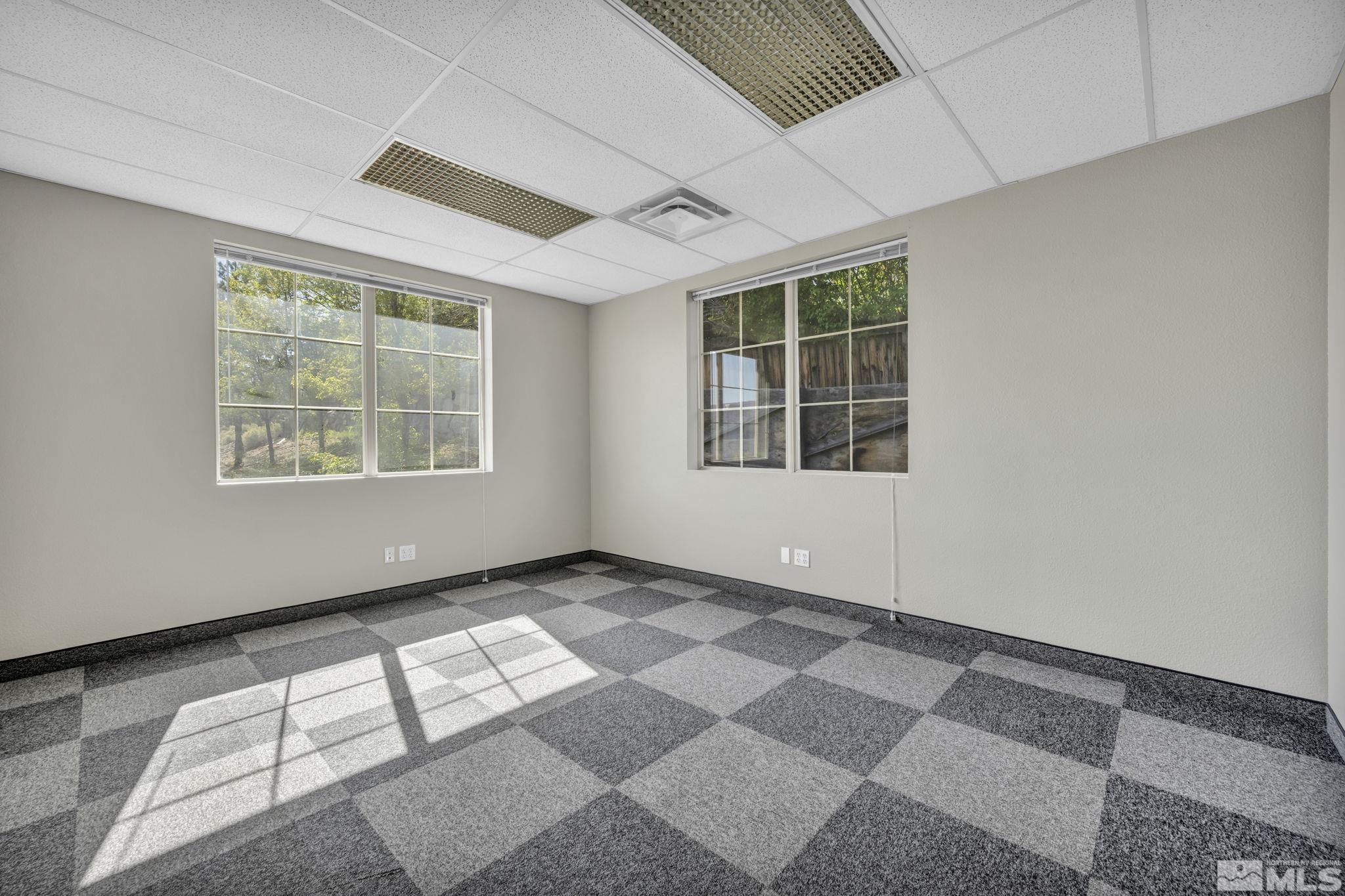 783 Basque Way Carson City, NV 89706 - Photo 17 of 39 an empty room with windows