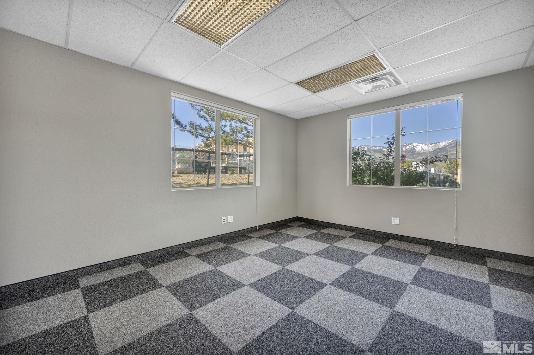 783 Basque Way Carson City, NV 89706 - Photo 18 of 39 a view of an empty room with a window