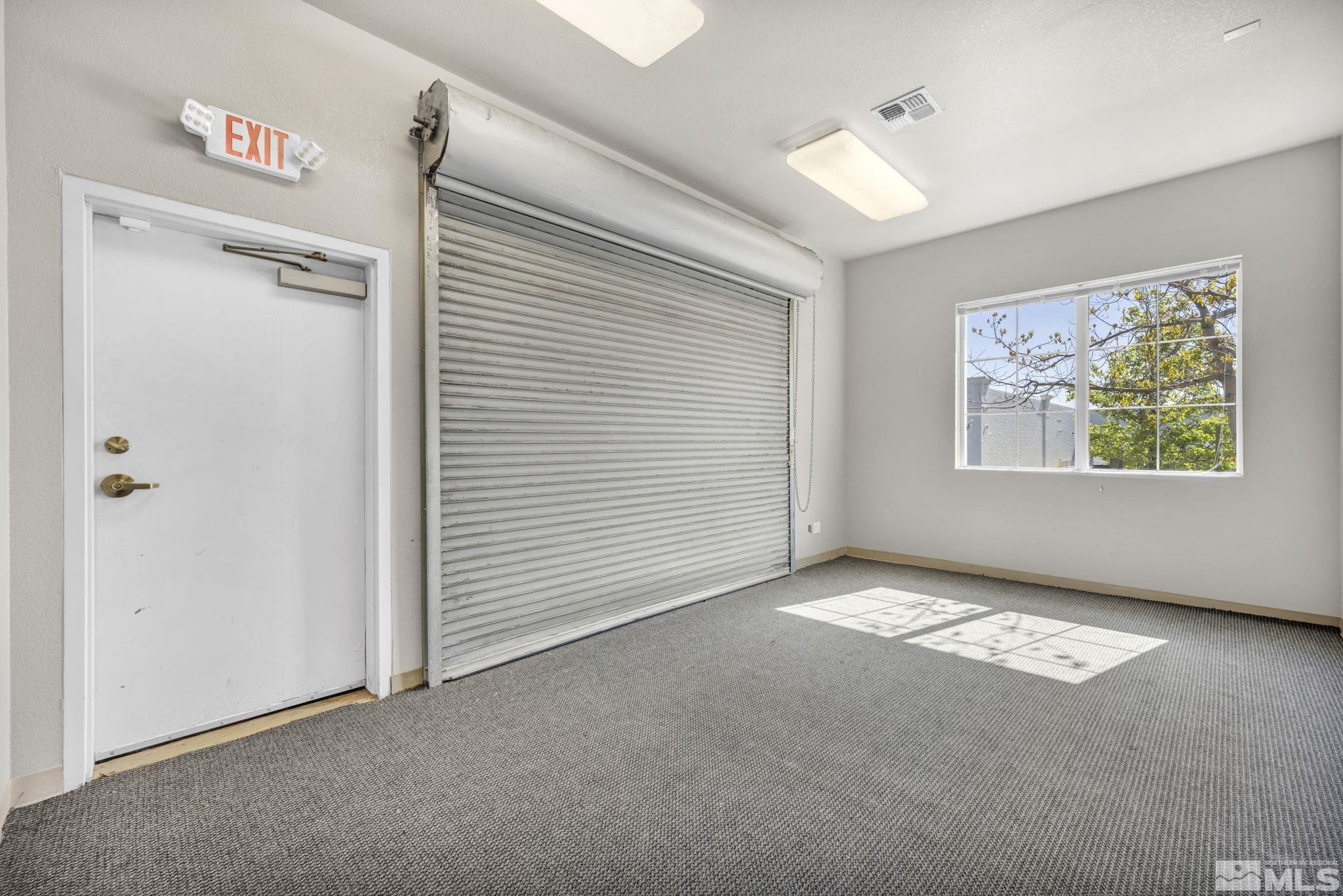 783 Basque Way Carson City, NV 89706 - Photo 26 of 39 a view of an empty room with a window