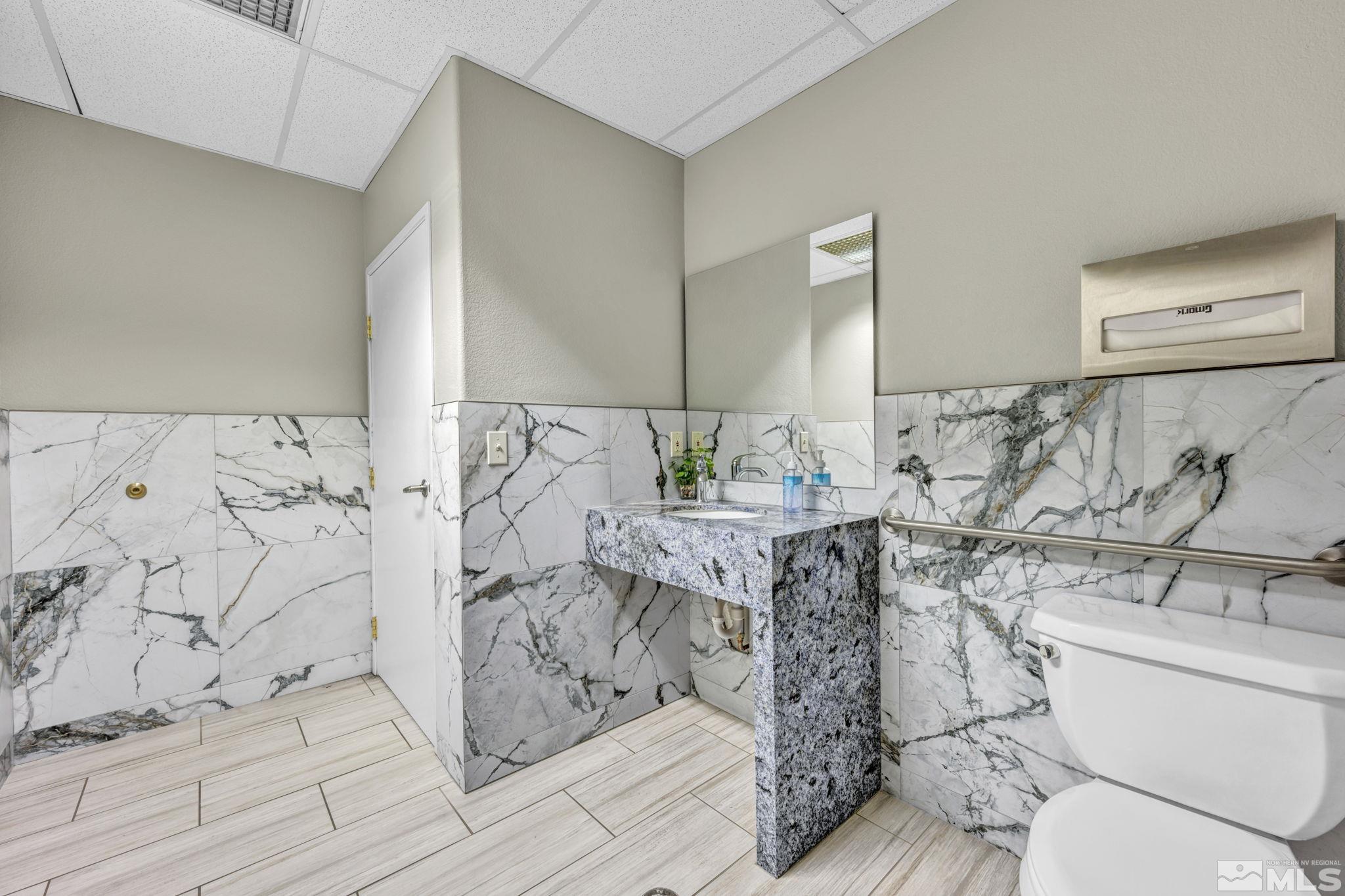 783 Basque Way Carson City, NV 89706 - Photo 31 of 39 a bathroom with a sink toilet and shower