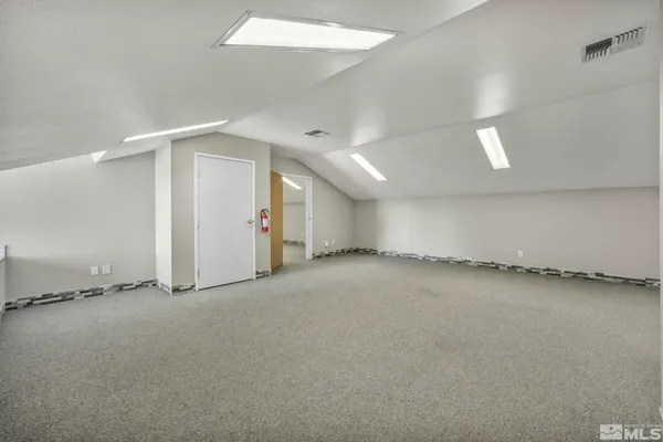 an empty room with a natural light