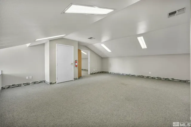 an empty room with a natural light