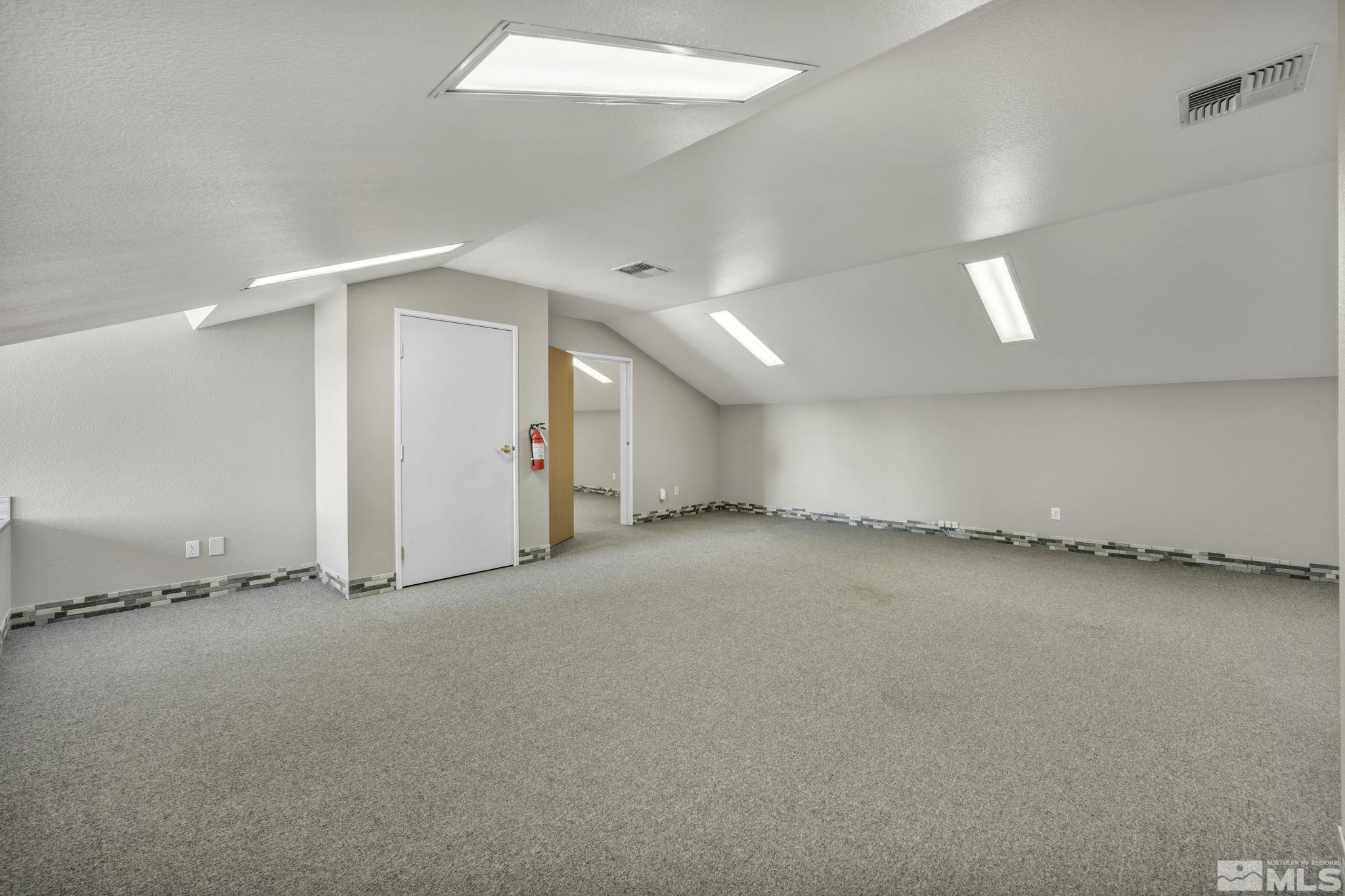 783 Basque Way Carson City, NV 89706 - Photo 36 of 39 an empty room with a natural light