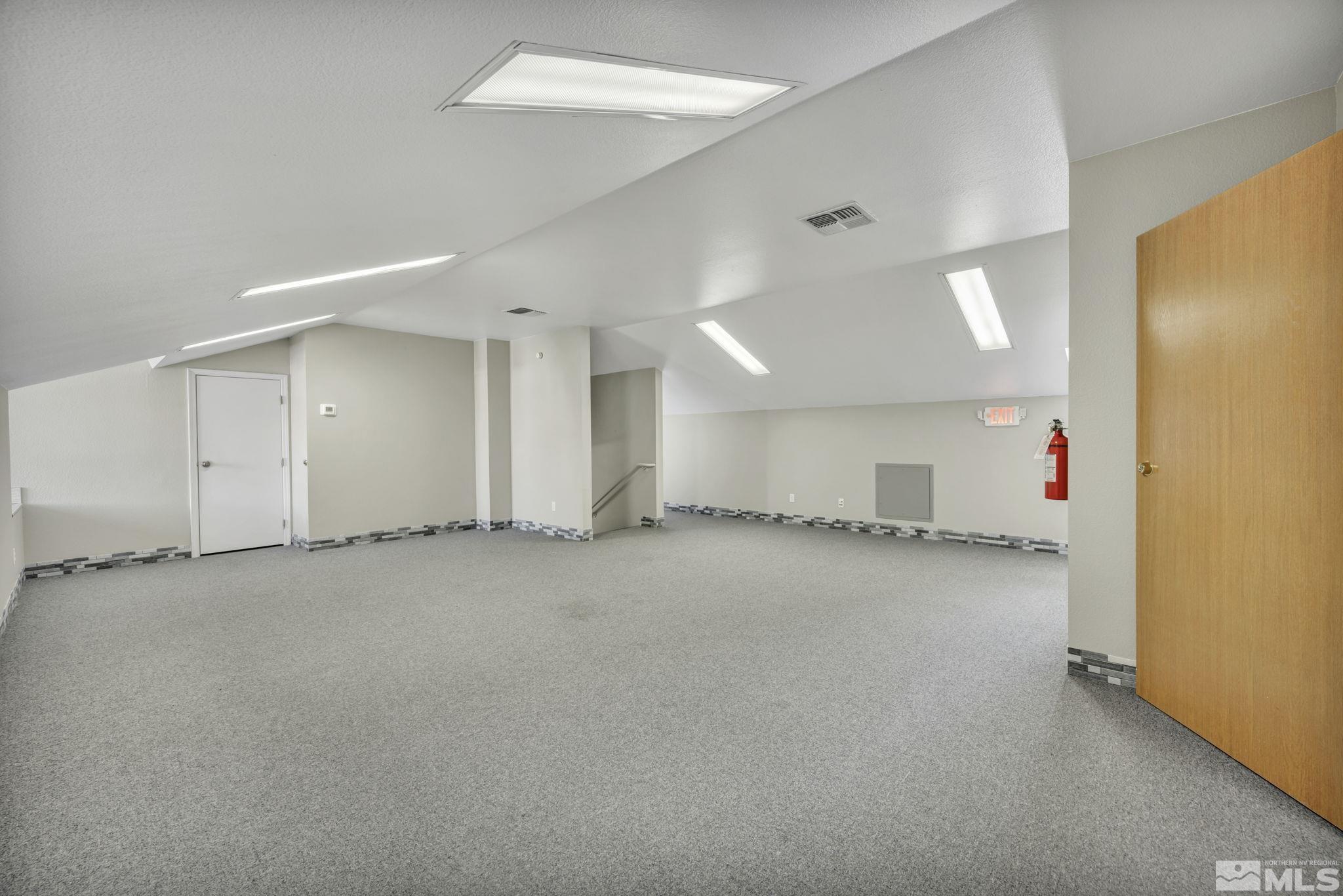 783 Basque Way Carson City, NV 89706 - Photo 37 of 39 an empty room with a natural light