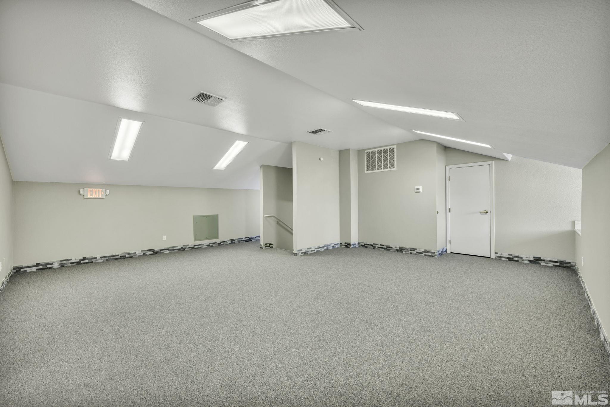 783 Basque Way Carson City, NV 89706 - Photo 38 of 39 an empty room with a fireplace