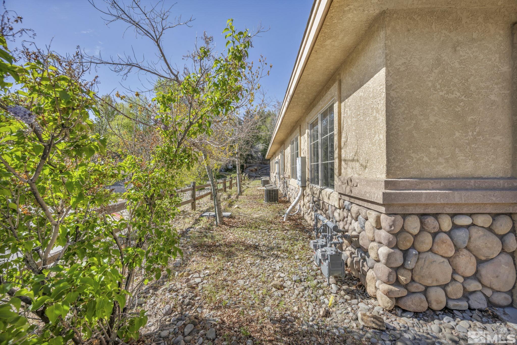 783 Basque Way Carson City, NV 89706 - Photo 6 of 39 a view of a house with a yard
