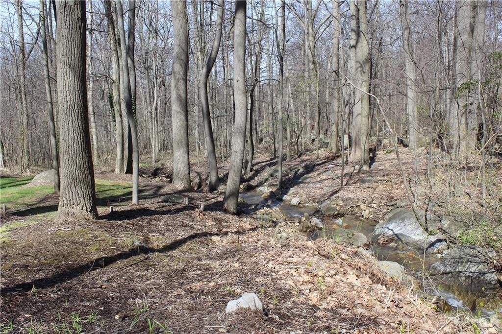 175 Ski-Slope Road Acme, PA 15610 - Photo 24 of 25 A quiet stream in the front of your home and is a beautiful site and sound.