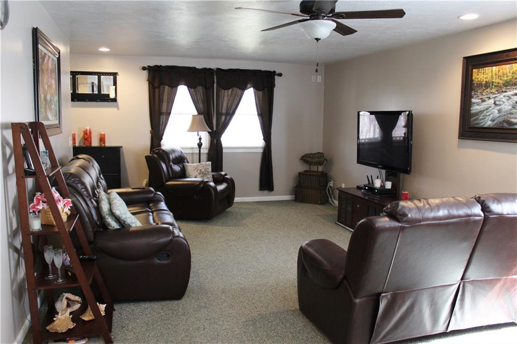 175 Ski-Slope Road Acme, PA 15610 - Photo 10 of 25 This family room is a central location for family time. Great space and beautiful decor.
