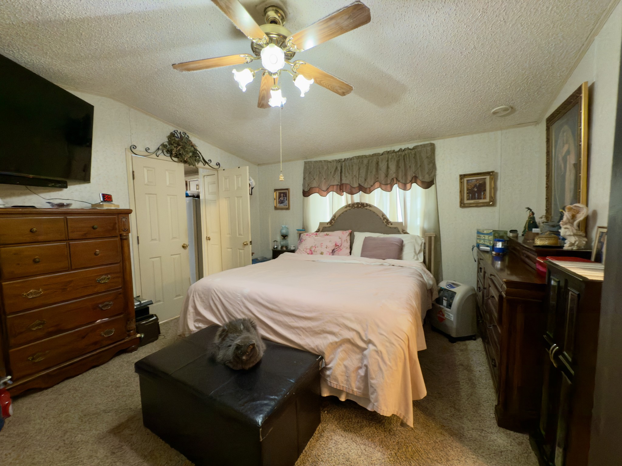 3794 Sulphur Creek Road Centerville, TN 37033 - Photo 11 of 21 a bedroom with a bed and a flat tv screen on the dresser
