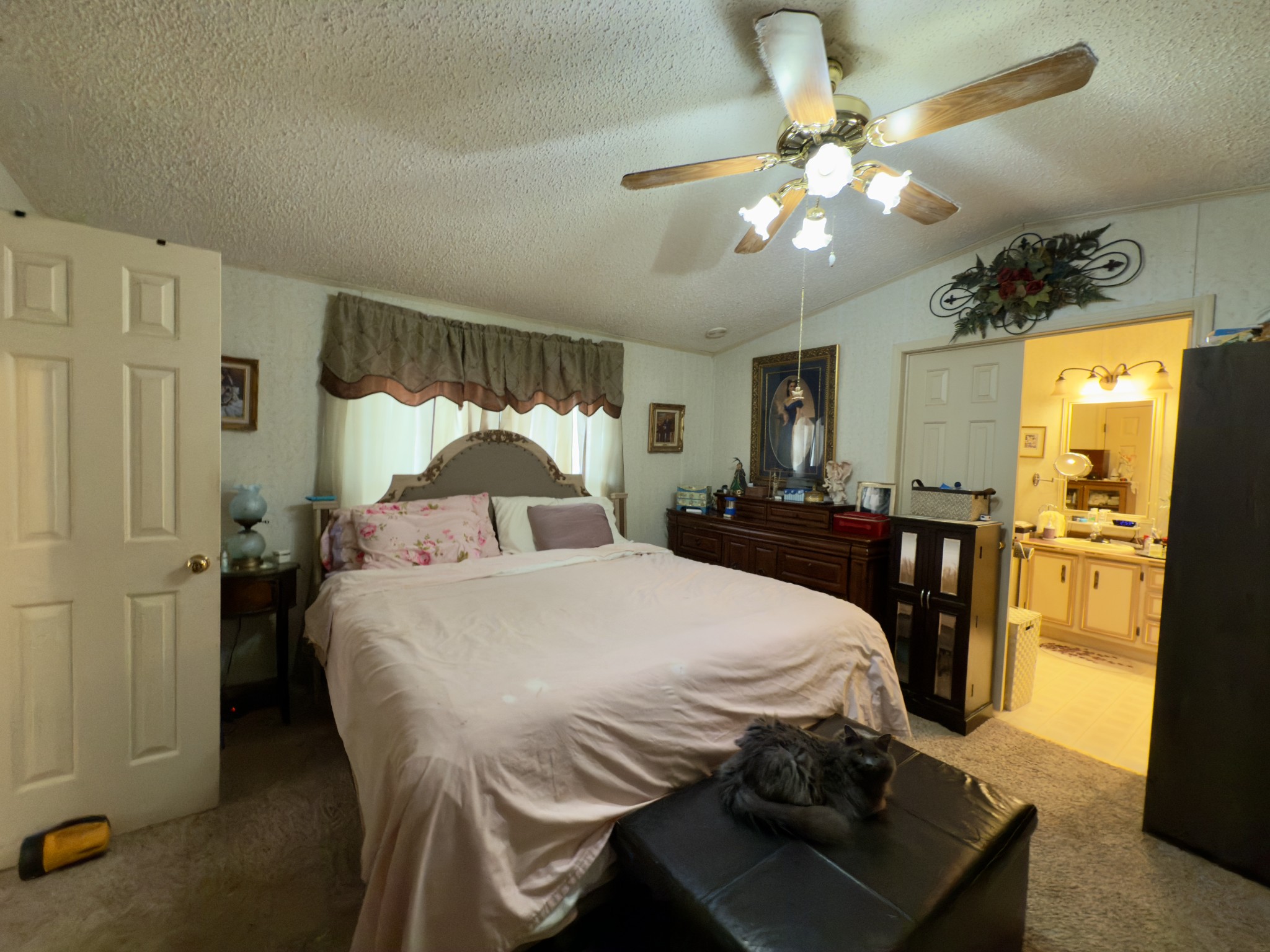 3794 Sulphur Creek Road Centerville, TN 37033 - Photo 10 of 21 a bedroom with a bed and chandelier