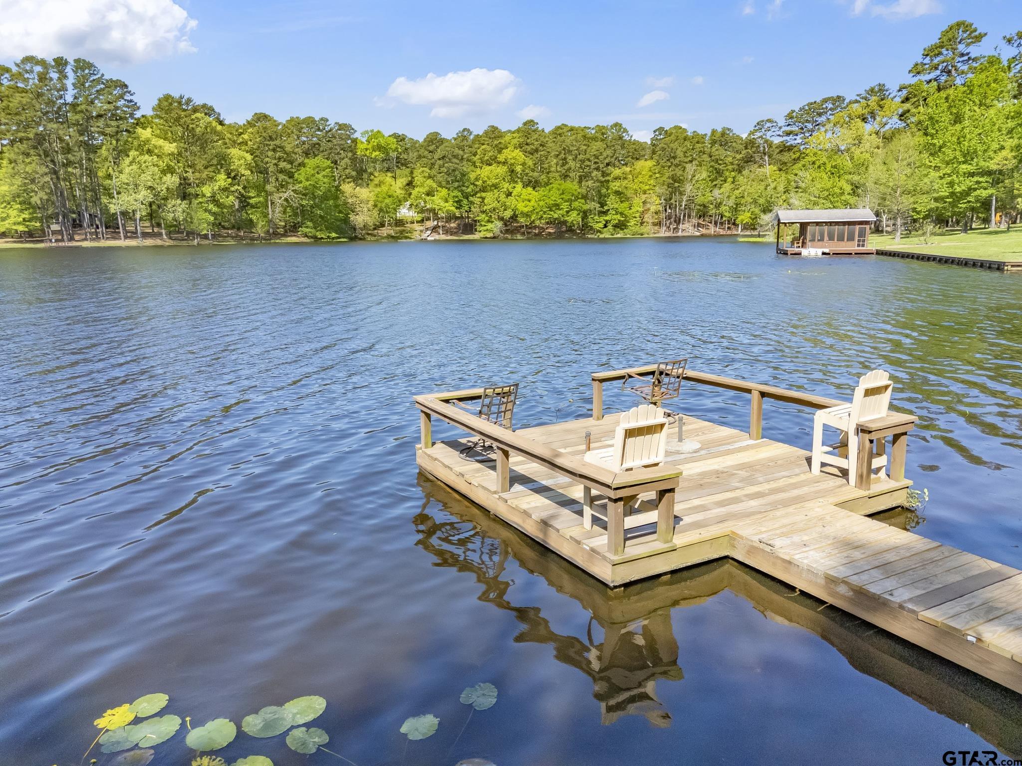 944 Clear Water Trail Holly Lake Ranch, TX 75765 - Photo 30 of 46 a small pool sitting in the middle of a lake